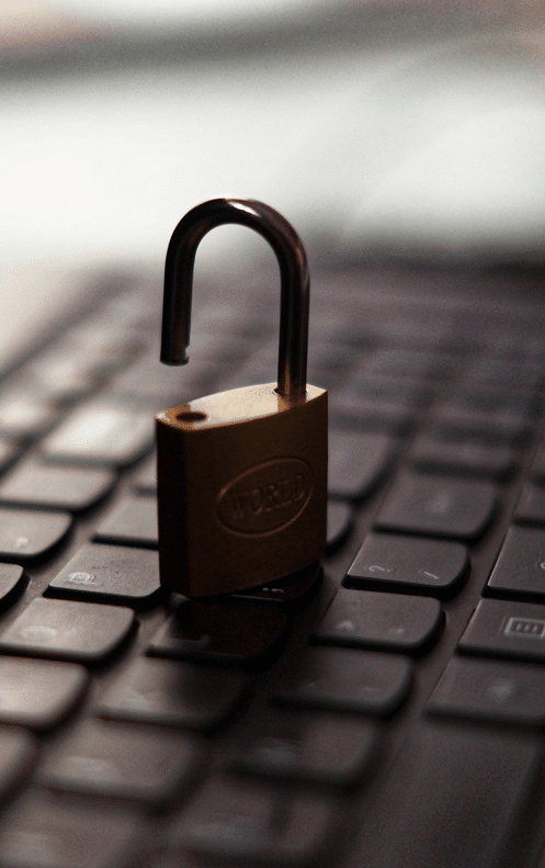 A padlock on a laptop keyboard.